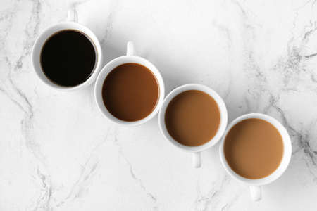 Cups of coffee on grunge backgroundの写真素材