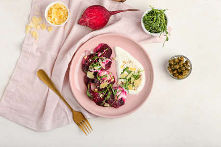 Composition with delicious beetroot carpaccio on light backgroundの写真素材