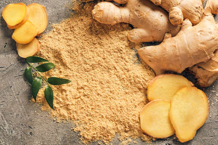 Composition with ginger powder on grunge backgroundの写真素材