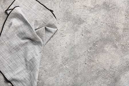 Fabric napkin on grunge background