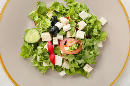 Plate with healthy Greek salad, closeupの写真素材