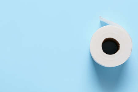 Roll of toilet paper on color backgroundの写真素材