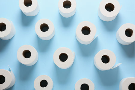 Rolls of toilet paper on color backgroundの写真素材
