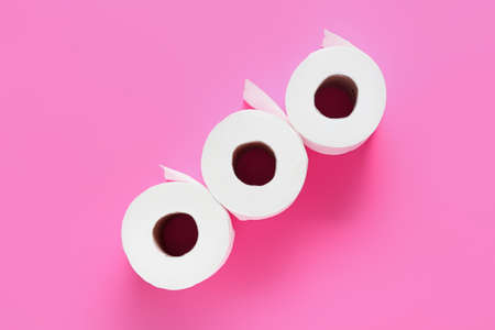 Rolls of toilet paper on color backgroundの写真素材