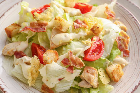 Plate with tasty Caesar salad, closeupの写真素材