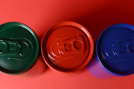 Cans of soda on color background, conceptの写真素材