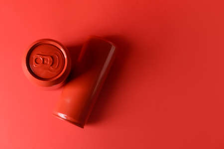 Cans of soda on color backgroundの写真素材