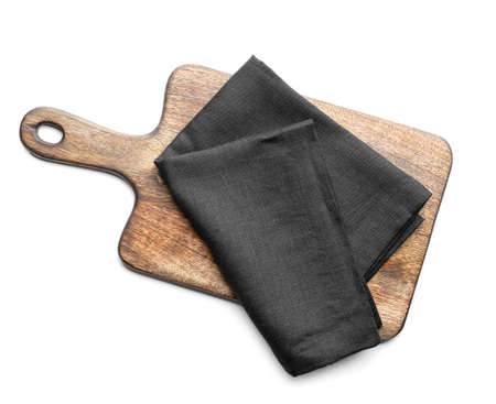 Fabric napkin and wooden board on white backgroundの写真素材
