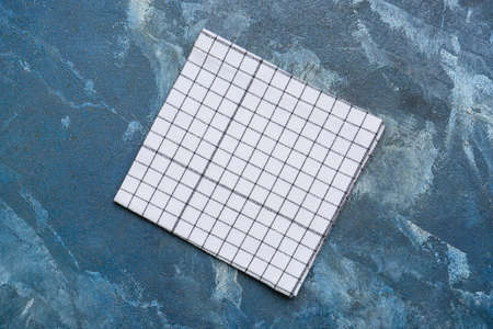 Fabric napkin on color background