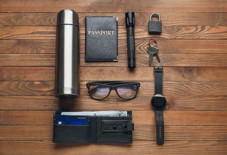 Set of items for travel on wooden backgroundの写真素材