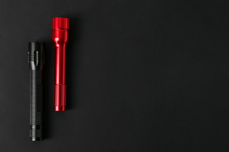 Modern flashlights on dark backgroundの写真素材
