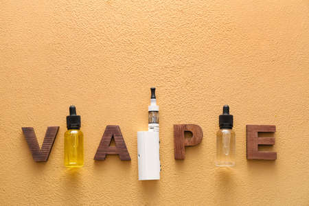 Vape mod with oil on color backgroundの写真素材