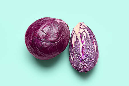 Fresh purple cabbage on color background