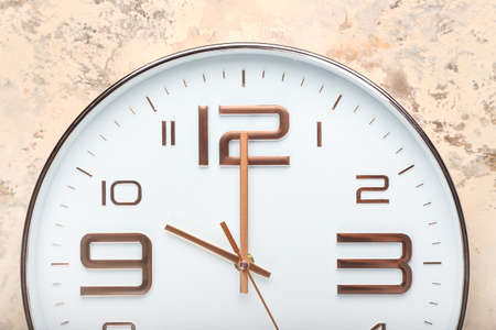 Stylish clock on grunge backgroundの写真素材