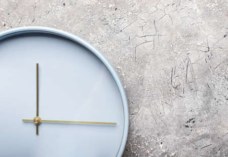 Stylish clock on grunge background