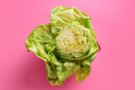 fresh cut cabbage on color background