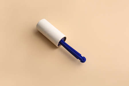 Lint roller on color backgroundの写真素材