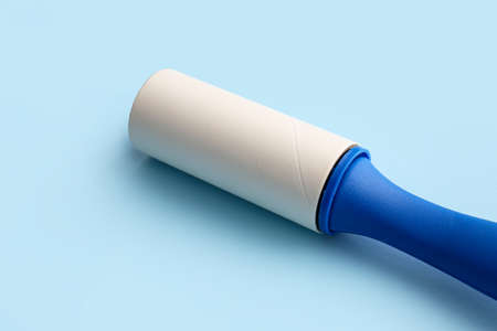 Lint roller on color backgroundの写真素材