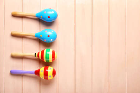 Mexican maracas on wooden background
