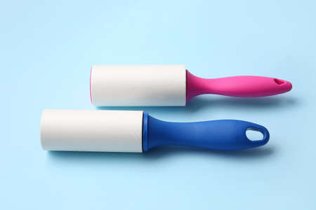 Lint rollers on color backgroundの写真素材