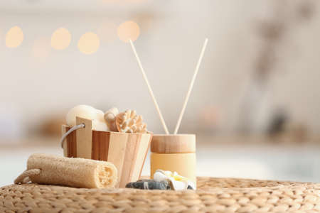 Beautiful spa composition on pouf in salon