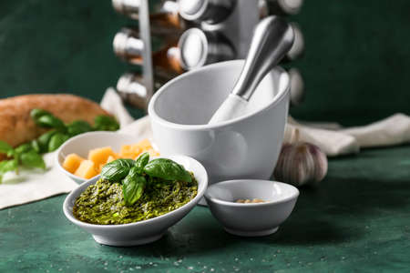 Mortar with tasty pesto sauce on table, closeupの写真素材