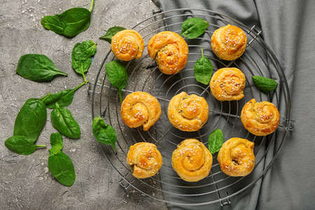 Puff pastry stuffed with spinach on grunge backgroundの写真素材