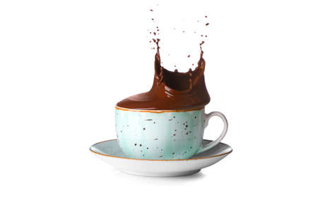 Cup of tasty hot coffee with splashes on white backgroundの写真素材