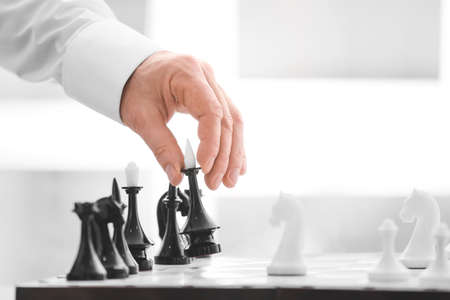 man playing chess in roomの写真素材