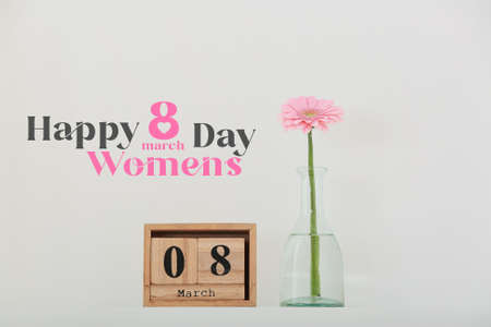 Beautiful greeting card for International Women's Day celebration with calendar and flowerの写真素材