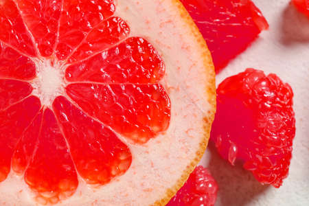 Cut grapefruit on light background, closeupの写真素材