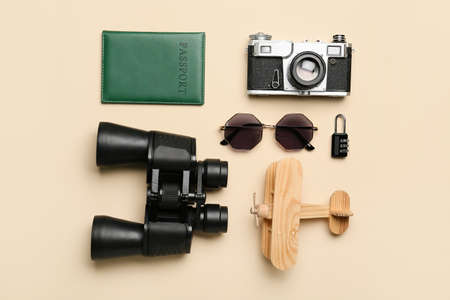 Composition with travel items, sunglasses and passport on color backgroundの写真素材