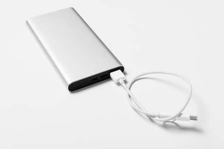 Modern power bank isolated on white background, closeupの写真素材