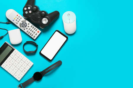 Set of different gadgets on color backgroundの写真素材