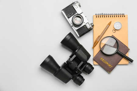 Set of travel items with passport and notebook on white backgroundの写真素材