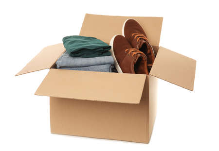 Wardrobe box with clothes and shoes on white backgroundの写真素材