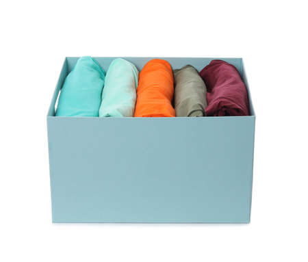 Wardrobe box with clothes on white background