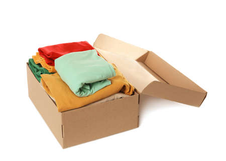 Wardrobe box with clothes on white background