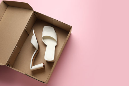 Wardrobe box with shoes on color backgroundの写真素材