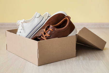 Wardrobe box with shoes near color wallの写真素材
