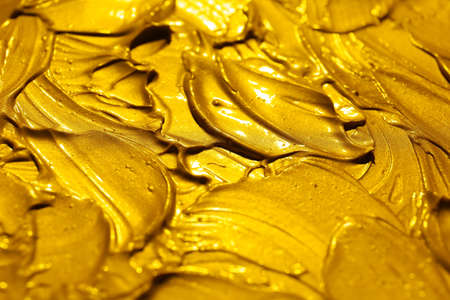 Golden brush strokes, closeup viewの写真素材