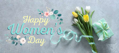 Beautiful greeting card for International Women's Day with gift and tulip flowersの写真素材