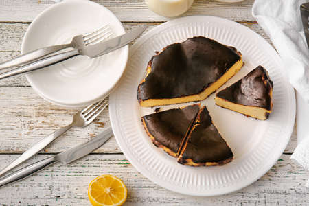 Tasty Basque burnt cheesecake on table