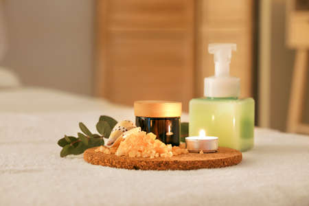 Spa supplies on table in beauty salonの写真素材