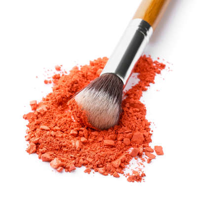 Makeup brush and loose eye shadow on white backgroundの写真素材