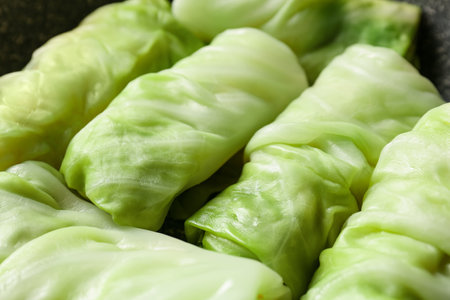 Uncooked cabbage rolls as background, closeupの写真素材