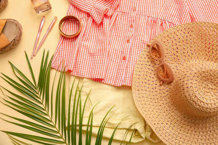 Female clothes and accessories on color background, closeupの写真素材