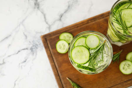 Glasses with cucumber lemonade on light backgroundの写真素材