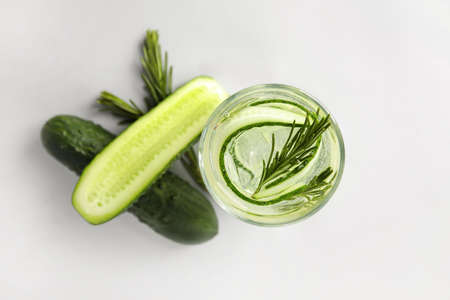 Glass with cucumber lemonade on white backgroundの写真素材