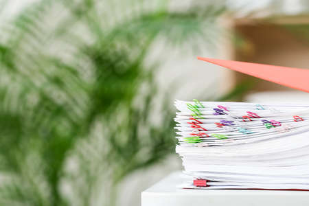 Stack of documents on table in office, closeupの写真素材